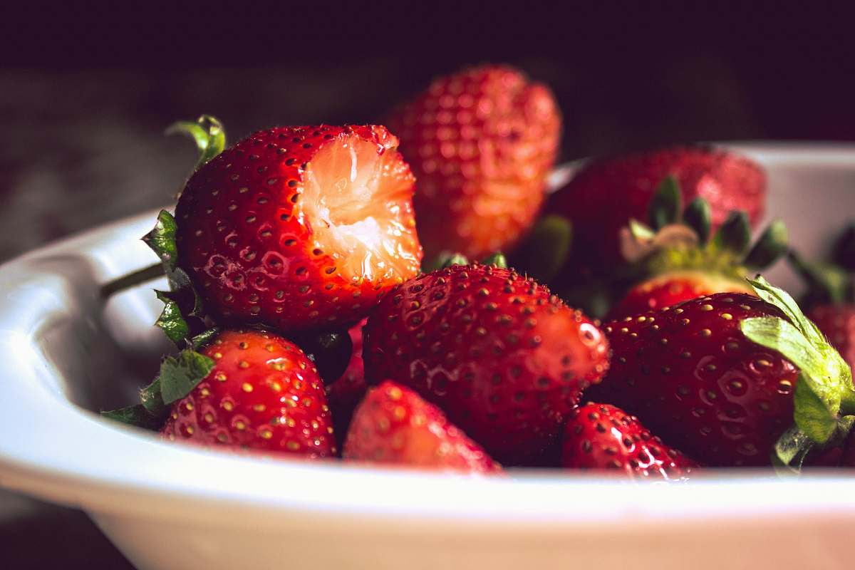fruit bunch of strawberries in white bowl strawberry