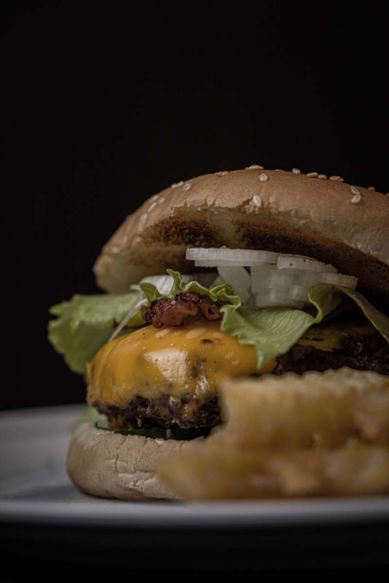 burger burger with ham, lettuce, and cheese yummy