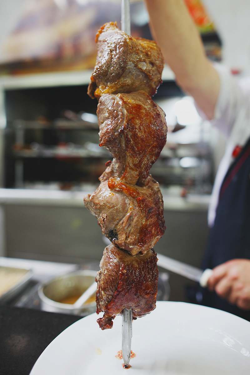 bread chicken barbecue on a metal stick person