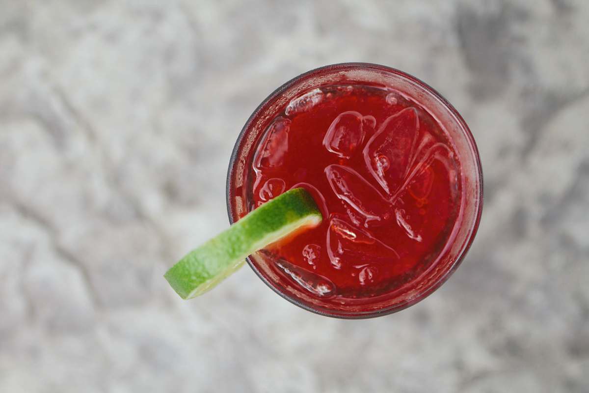 ketchup clear drinking glass with red juice beverage