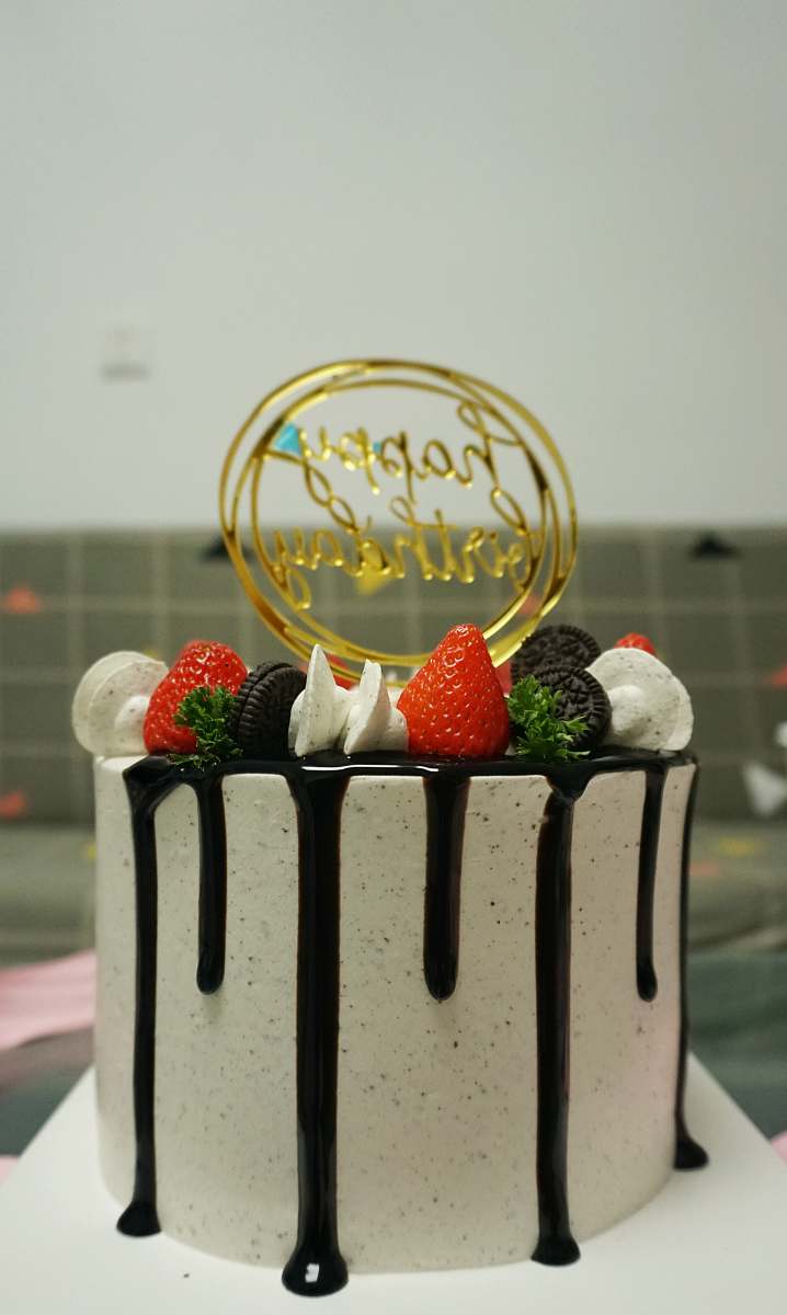 dessert clear glass cake with white and red strawberries cake