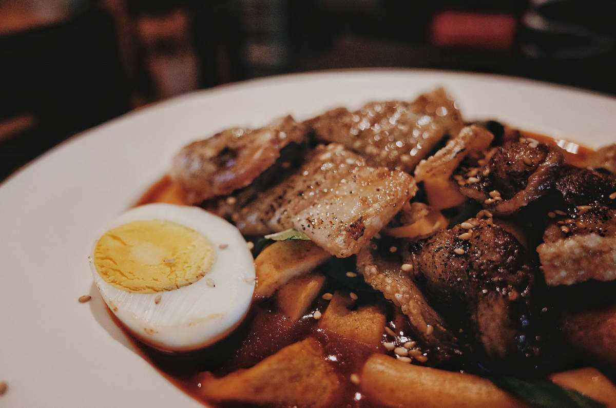 egg cooked food with white ceramic plate seasoning