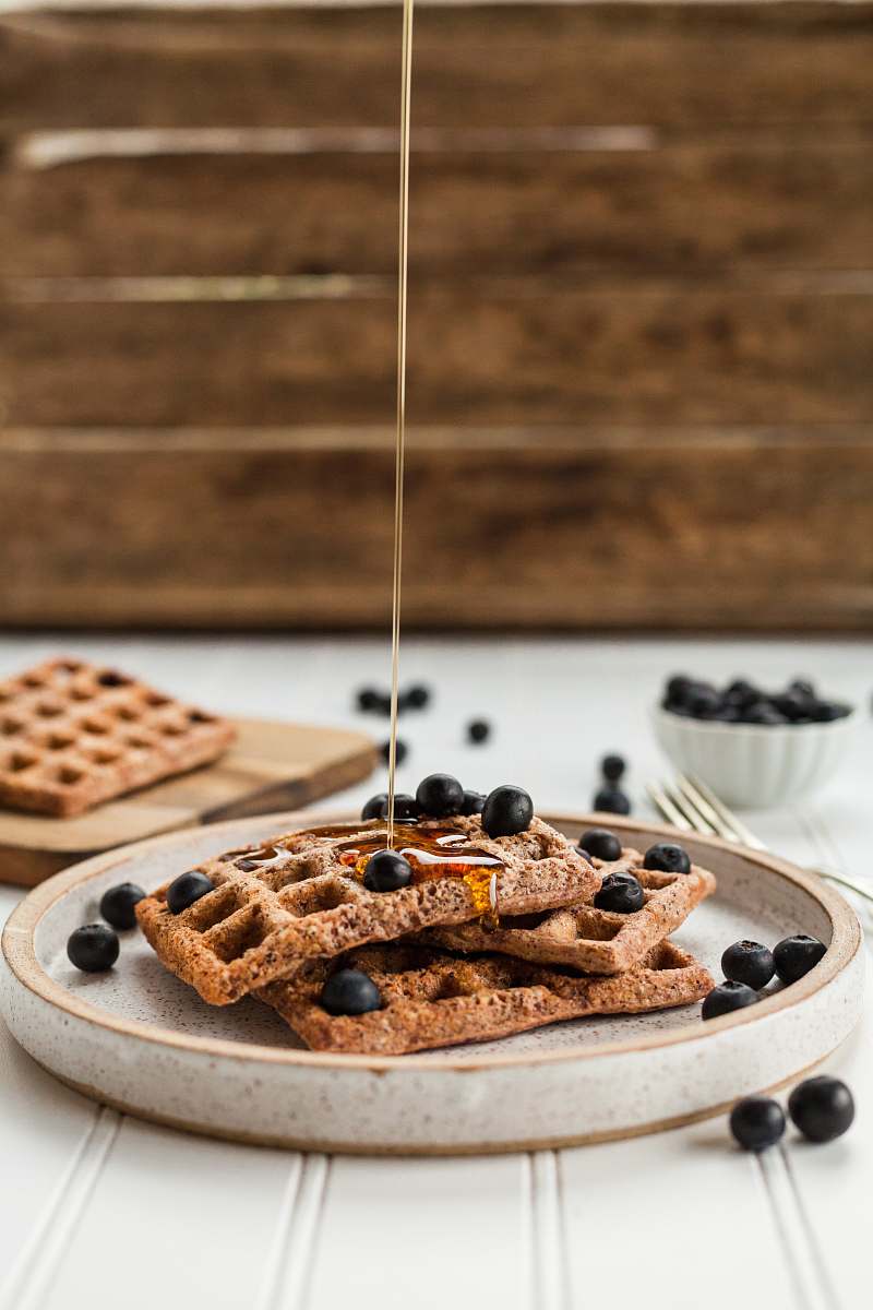 waffle cooked pastries on white plate breakfast