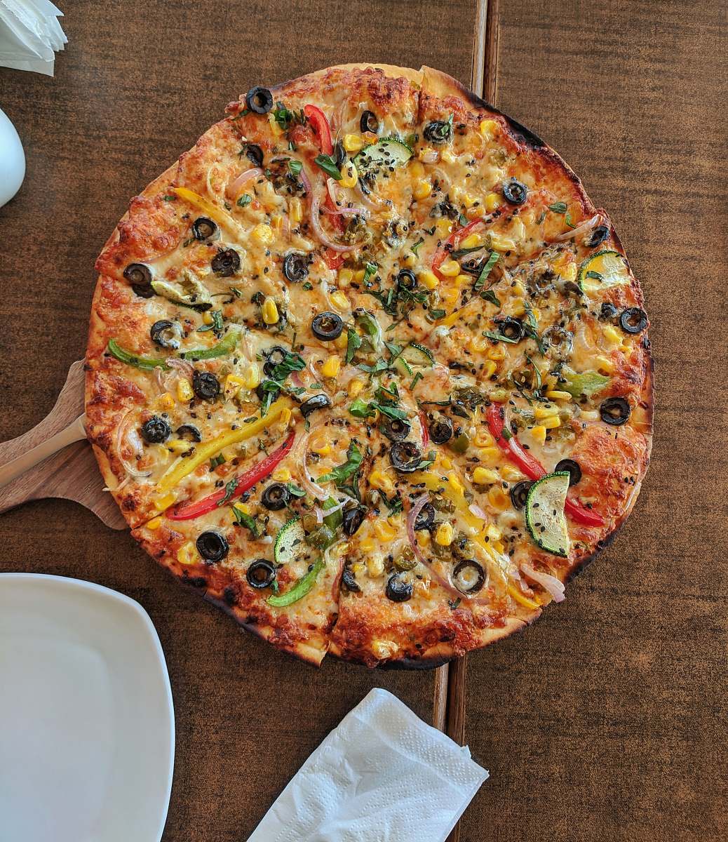 pizza cooked pizza on brown wooden table 52