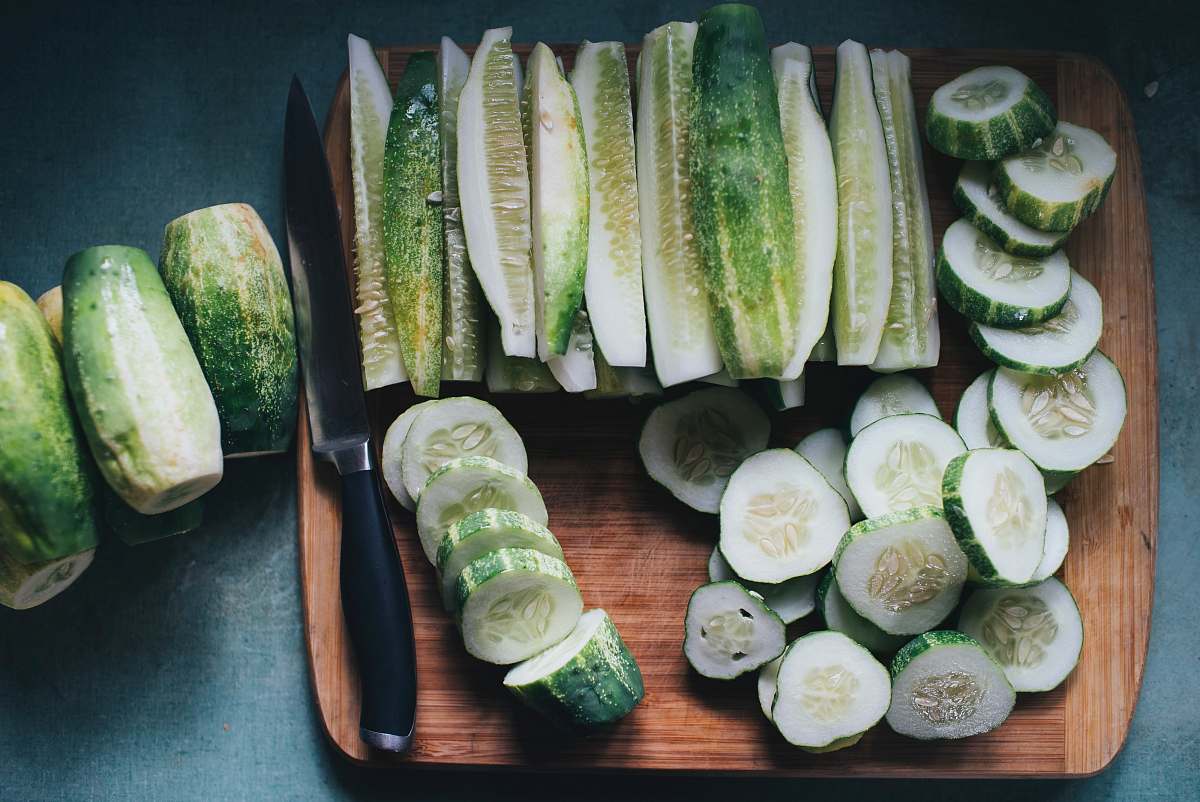 cucumber cucumbers beside silver knife vegetable