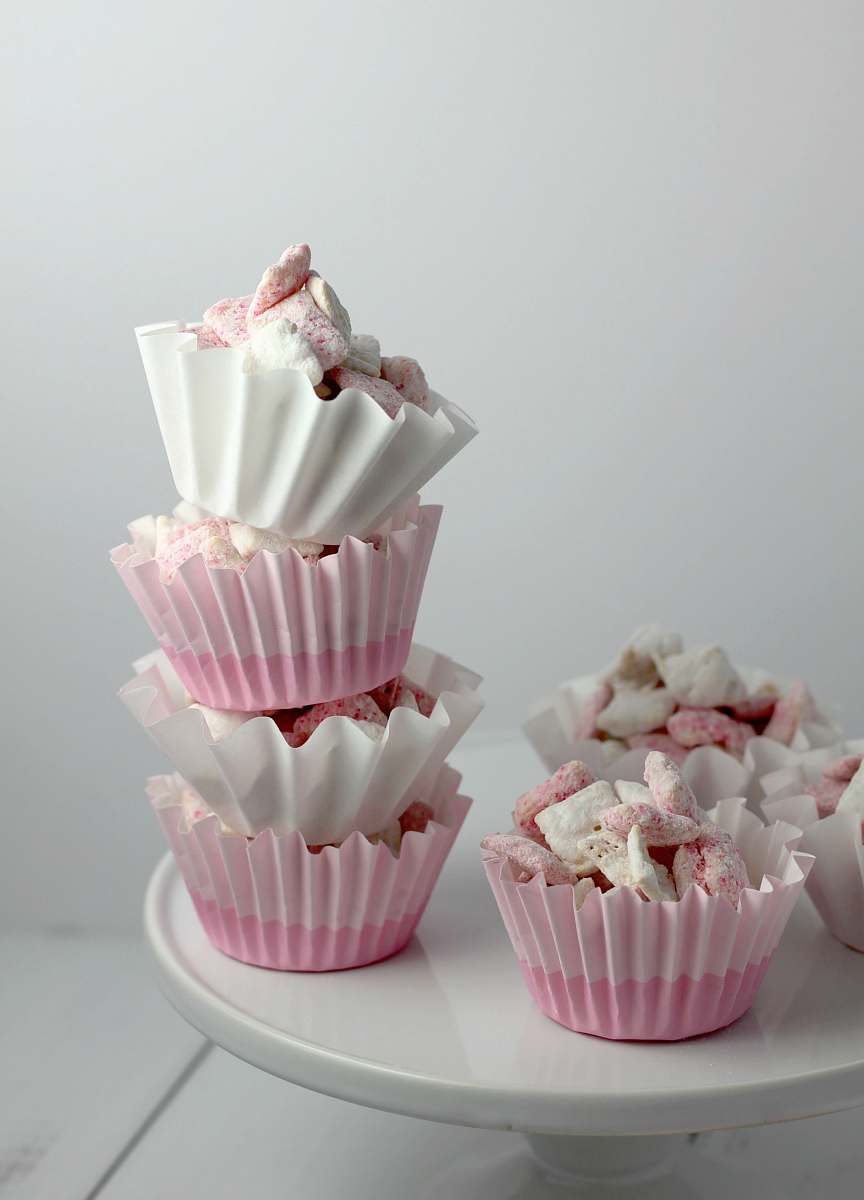 dessert cupcakes on white cupcake stand cream