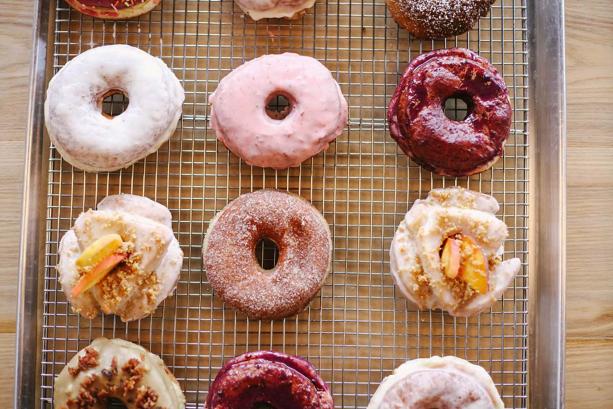 donut doughnuts on rectangular gray tray pastry