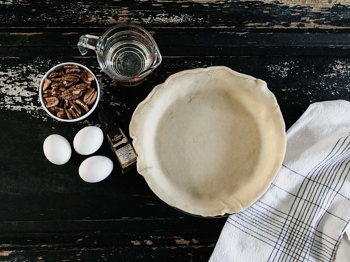 egg empty white plate beside three eggs bowl