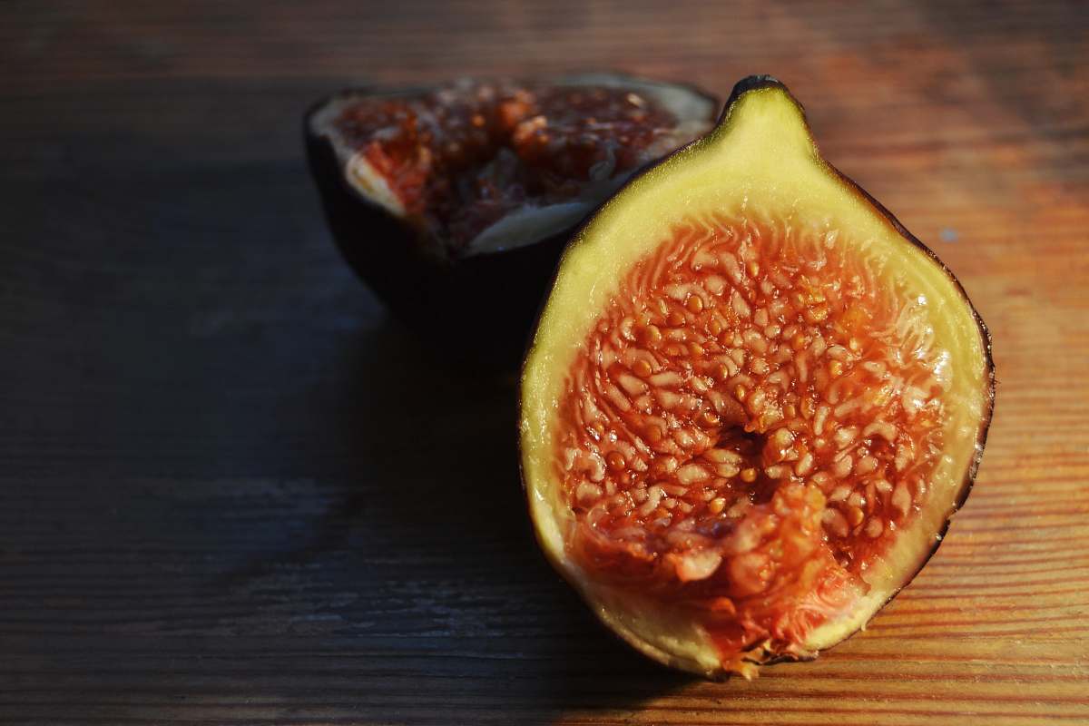 fruit fig on brown wooden surface fig