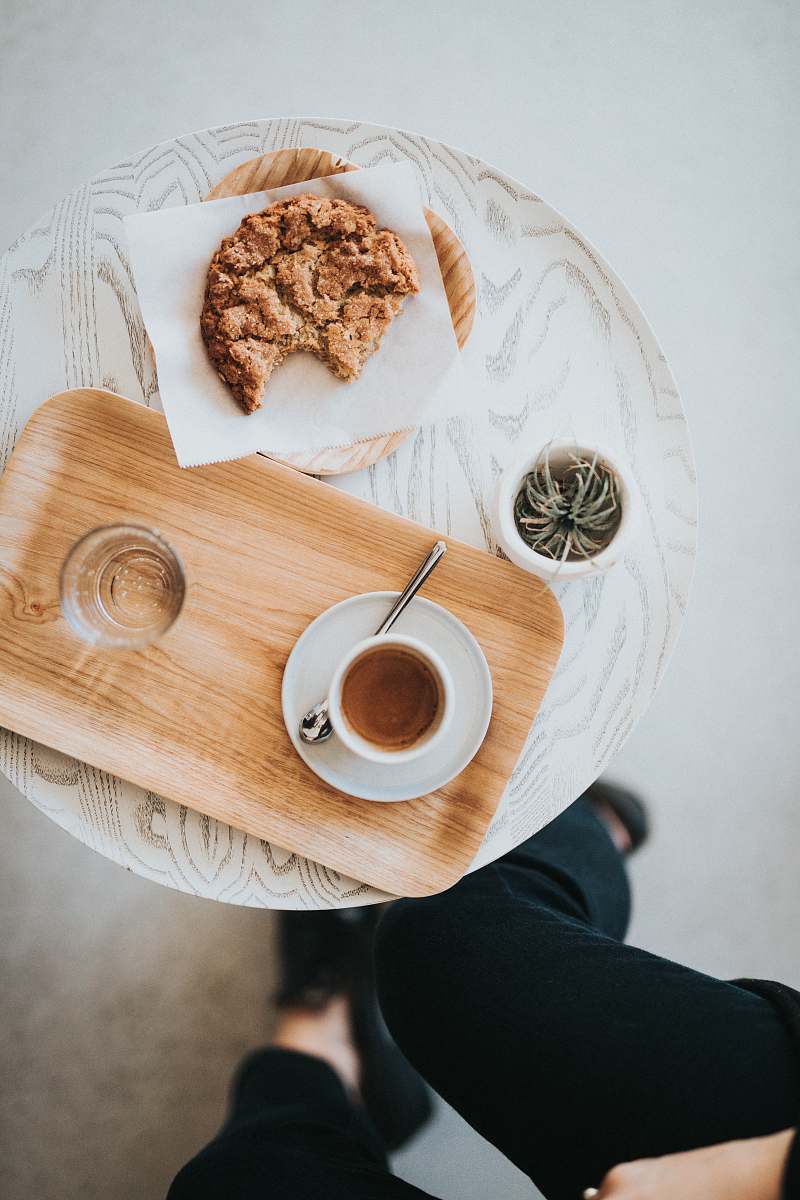 cup flat-lay photography of pastry and liquid-filled cup on tray drink