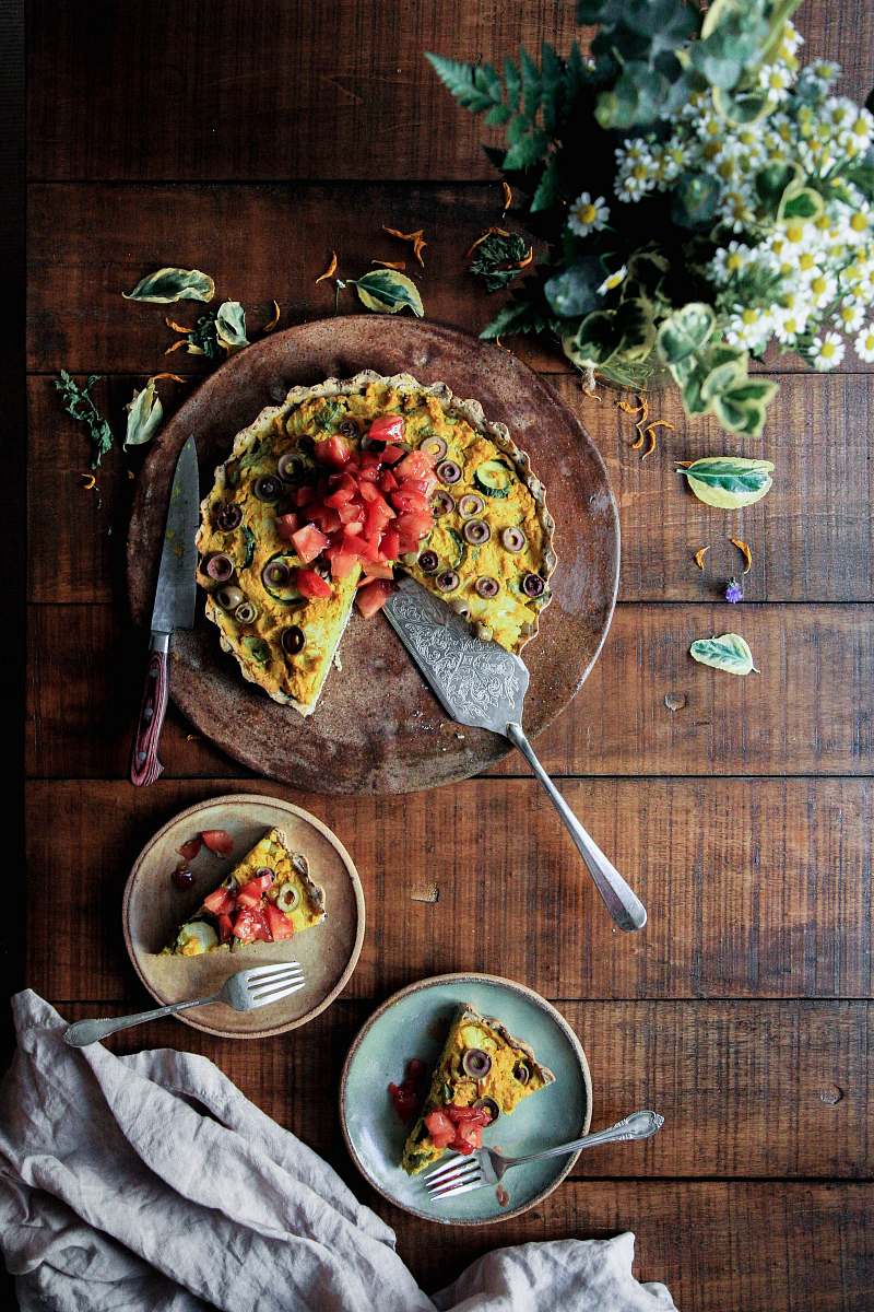 breakfast flat lay photography of pie with strawberry and olives toppings pottery