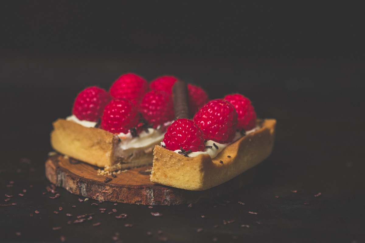 raspberry food photography of baked pastries with raspberry on top fruit