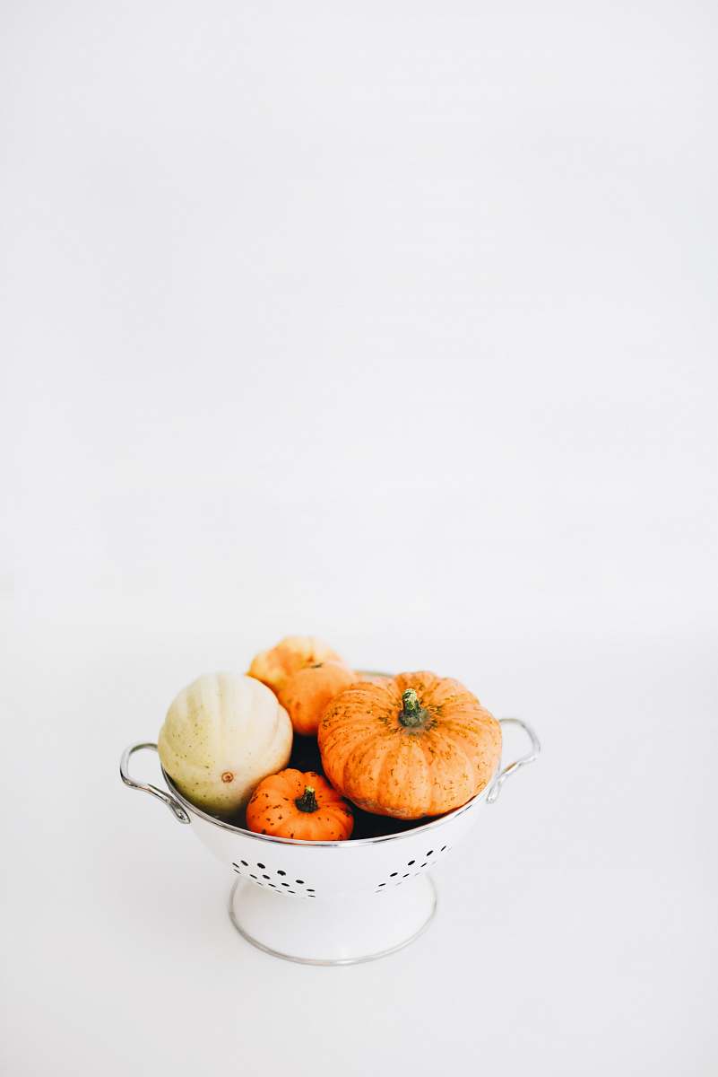 vegetable four round orange squashes on colander fall