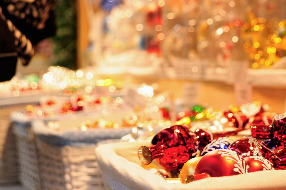 sweets four white wicker basket filled with Christmas decor lot selective focus photography confectionery
