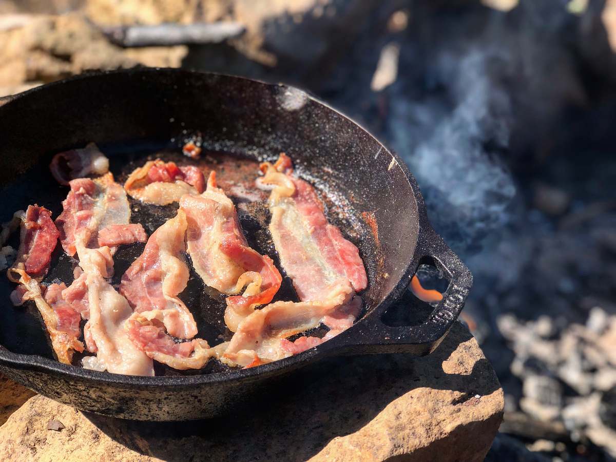 bacon fried bacon in frying pan bbq