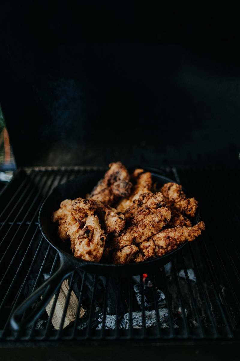 bbq fried meat in cast iron skillet fried chicken