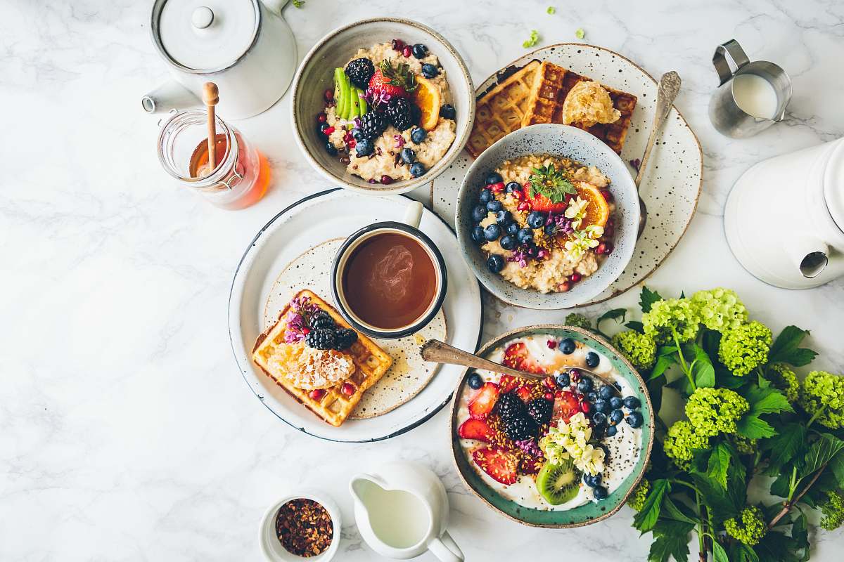 breakfast fruit salad on gray bowls brunch