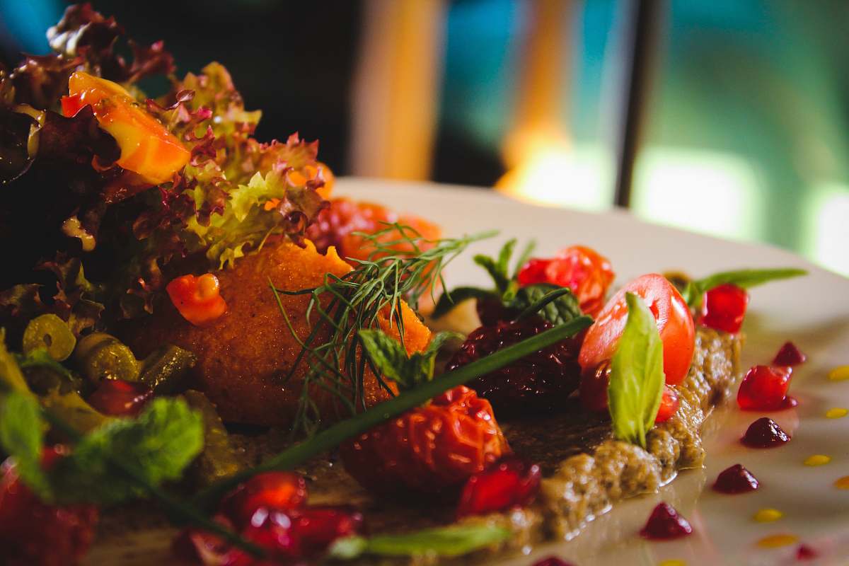 seasoning fruits and veggies on white plate meal