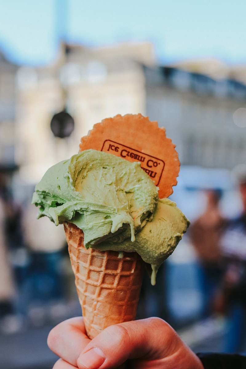 cream green ice cream in cone in macro photography creme