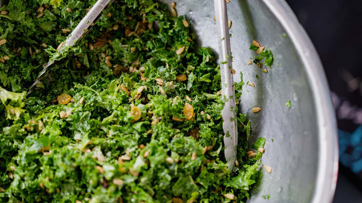 kale green vegetables on gray basin vegetable