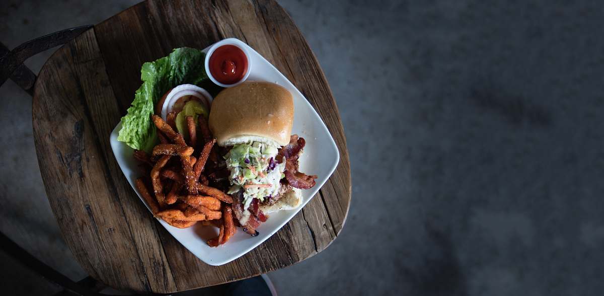 meal hamburger and fries on ceramic plate sandwich