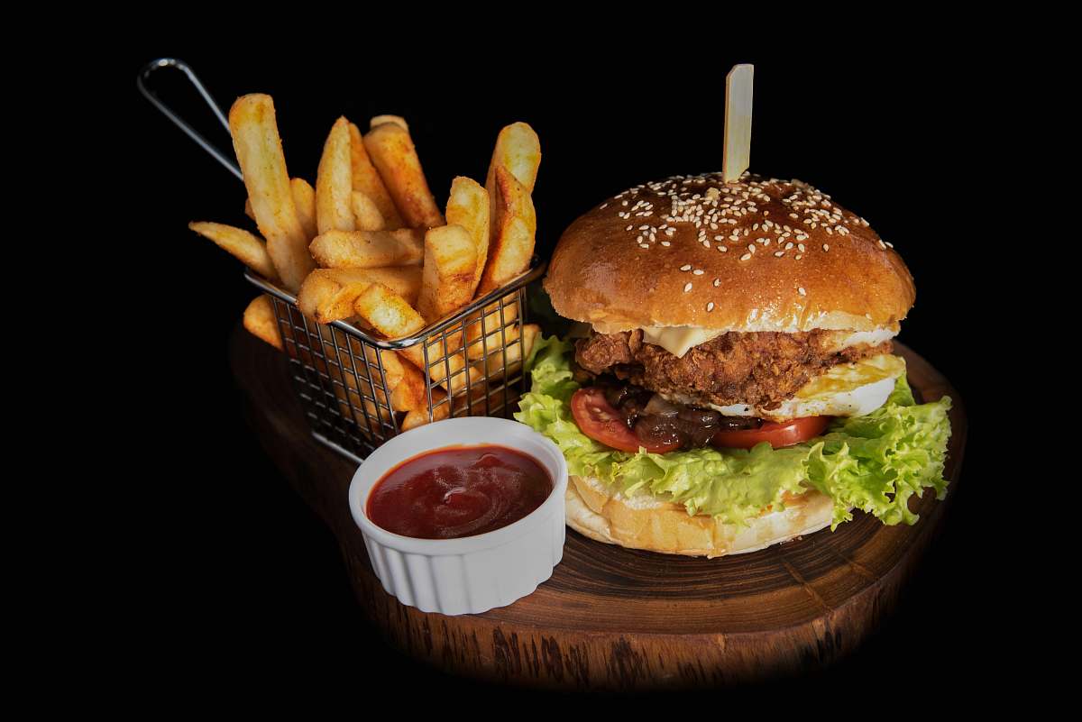 burger hamburger beside fries and ketchup fries