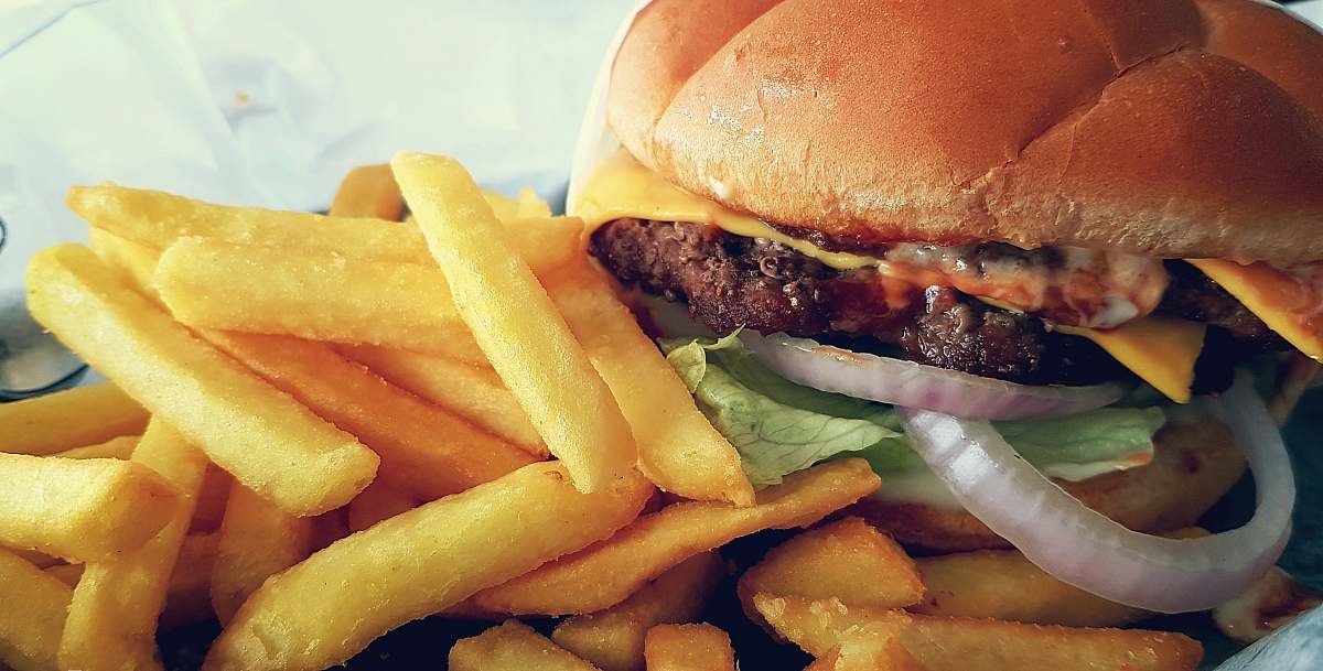 burger hamburger with lettuce and cheese and fries fries