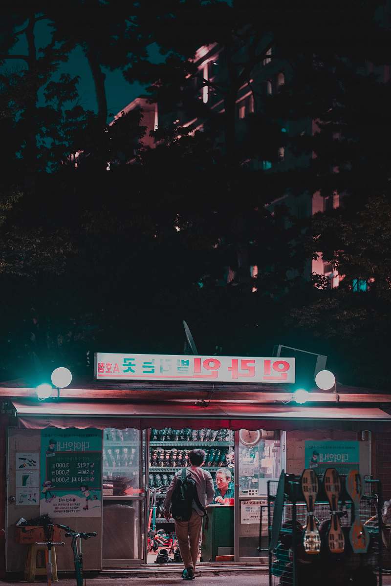 meal man standing at storefront human