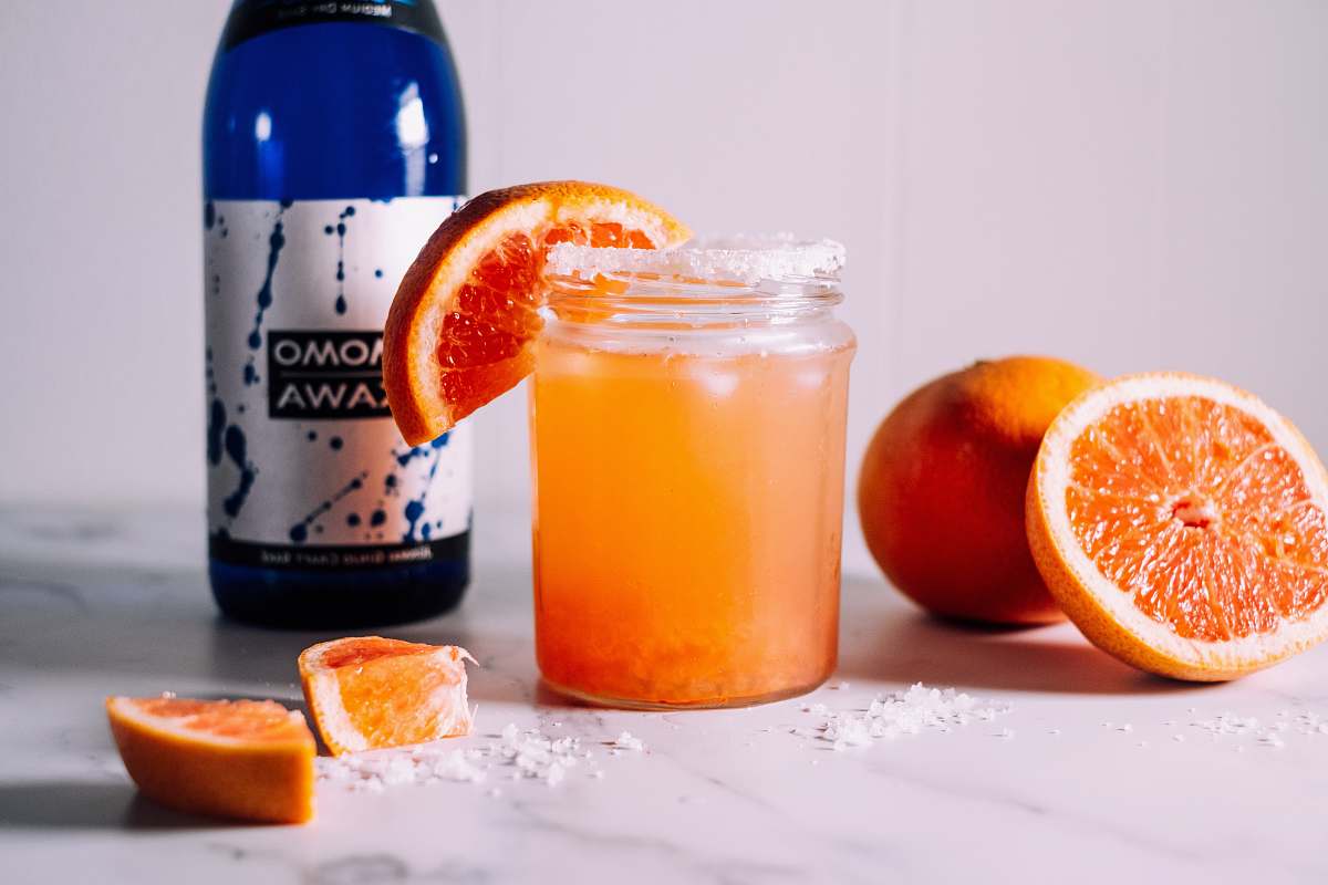 orange orange juice in clear glass mason jar citrus fruit