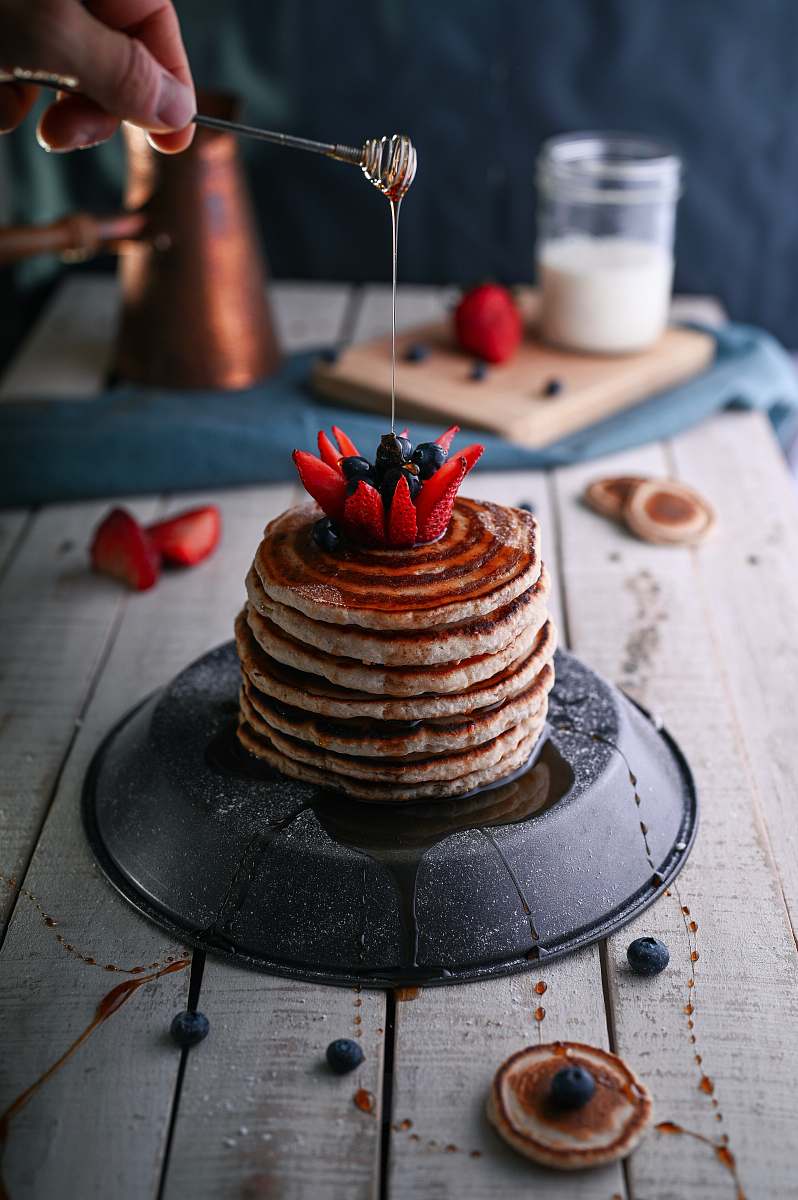 bread pancakes on black plate pancake