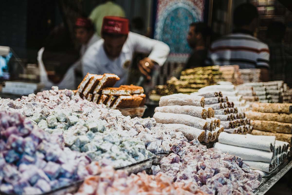human pastries display selective focus photography person