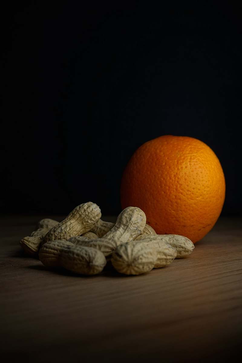 plant peanuts and orange fruit photograph orange