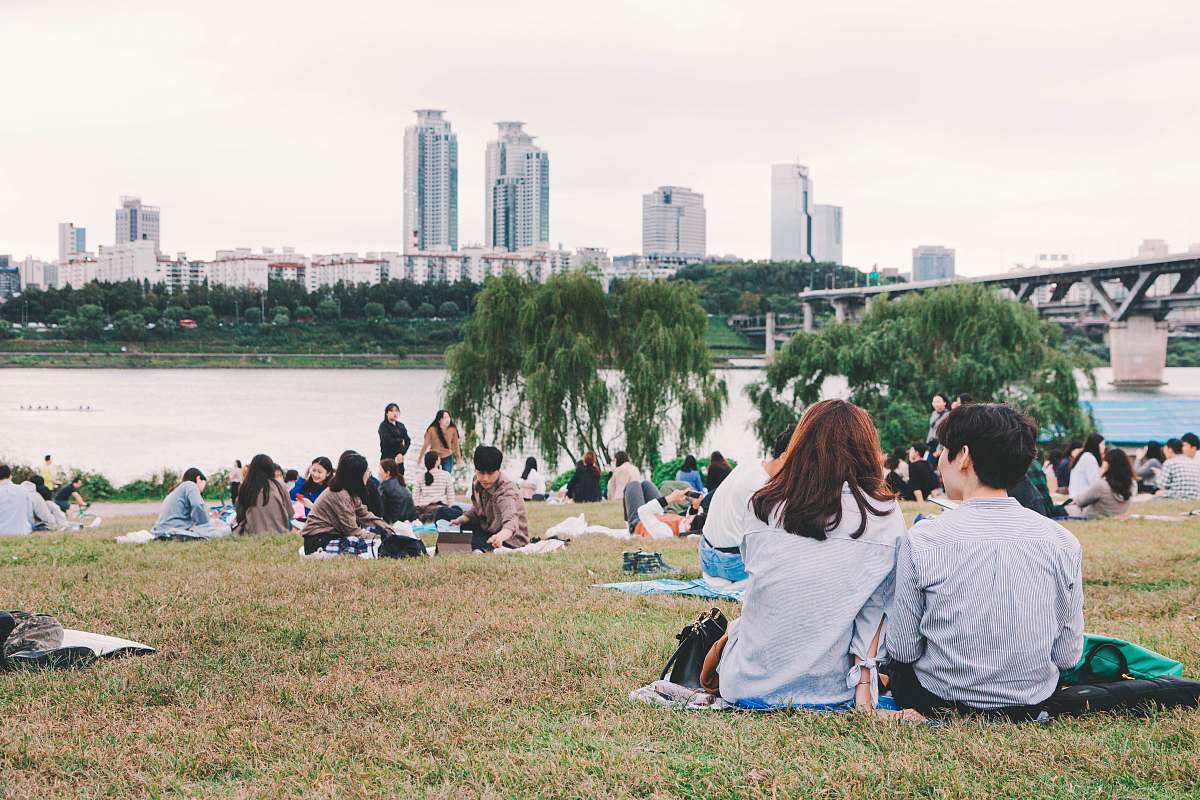 vacation people in park near river meal