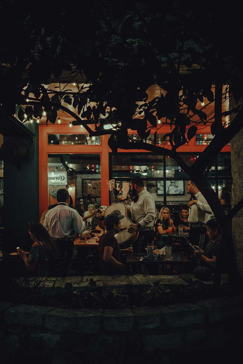 restaurant people playing instruments food court