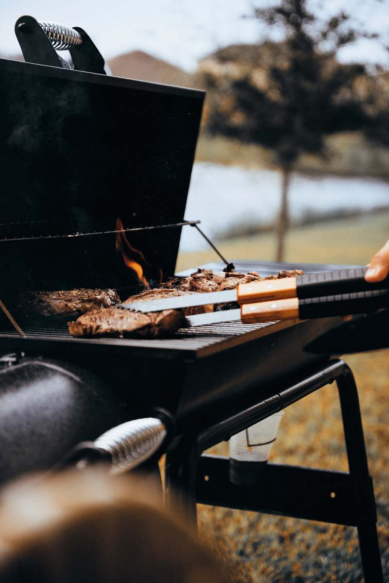 bbq person grilling meat outdoors west melbourne