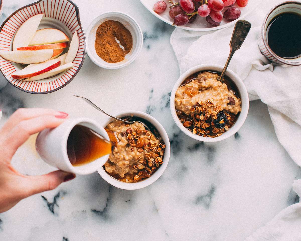 breakfast person holding white ceramic cup coffee