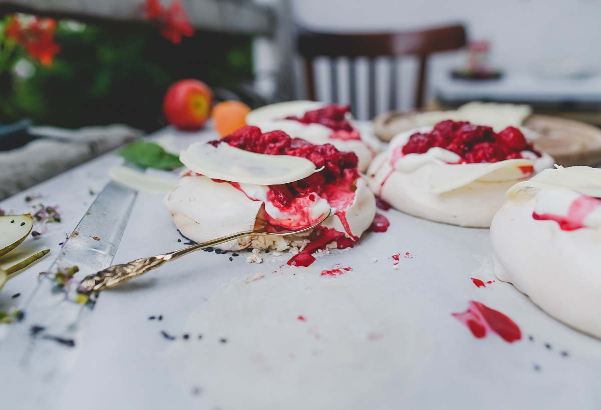 dessert photo of stainless steel spoon top of table berry