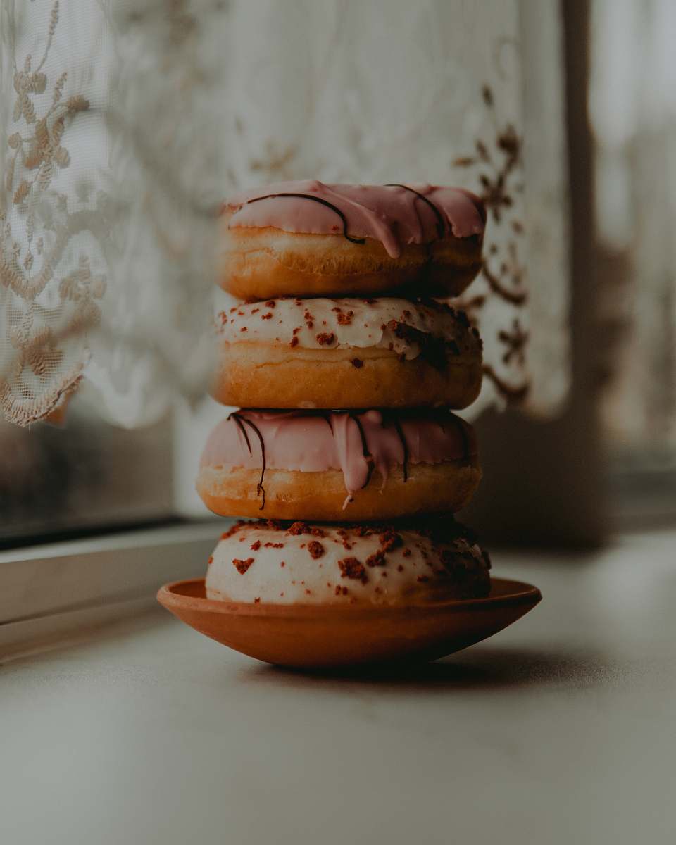 burger pile of four donuts bread