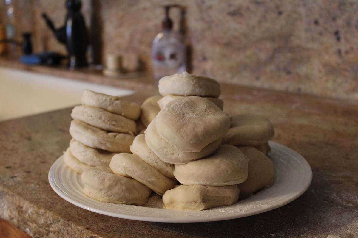 bread pile of unbaked bread slices on plate pita