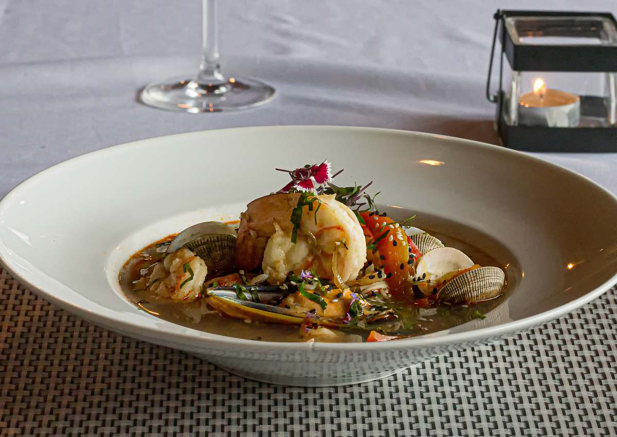 meal plate of food on brown surface dish