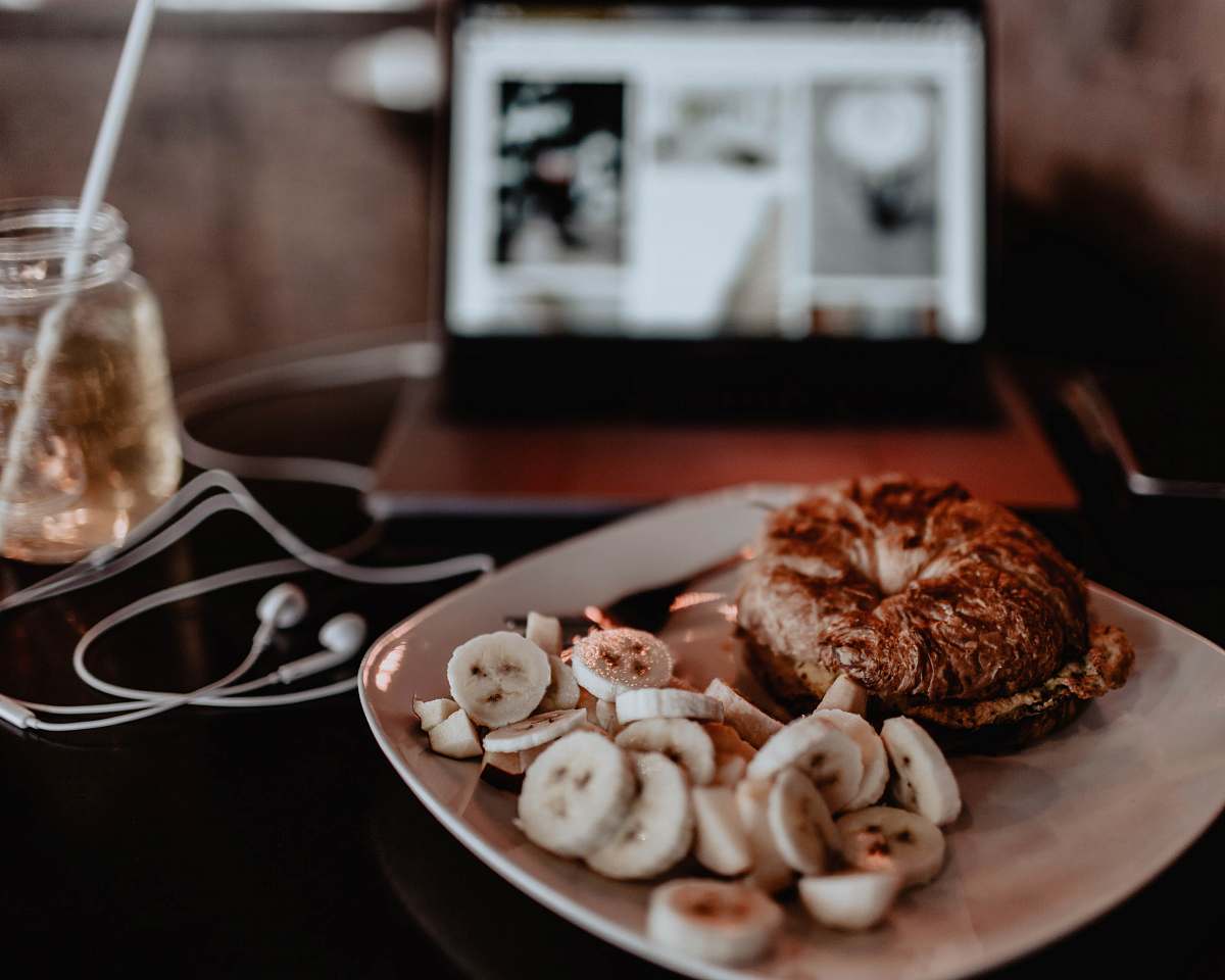 bread plate of slices of banana and doughnut bagel