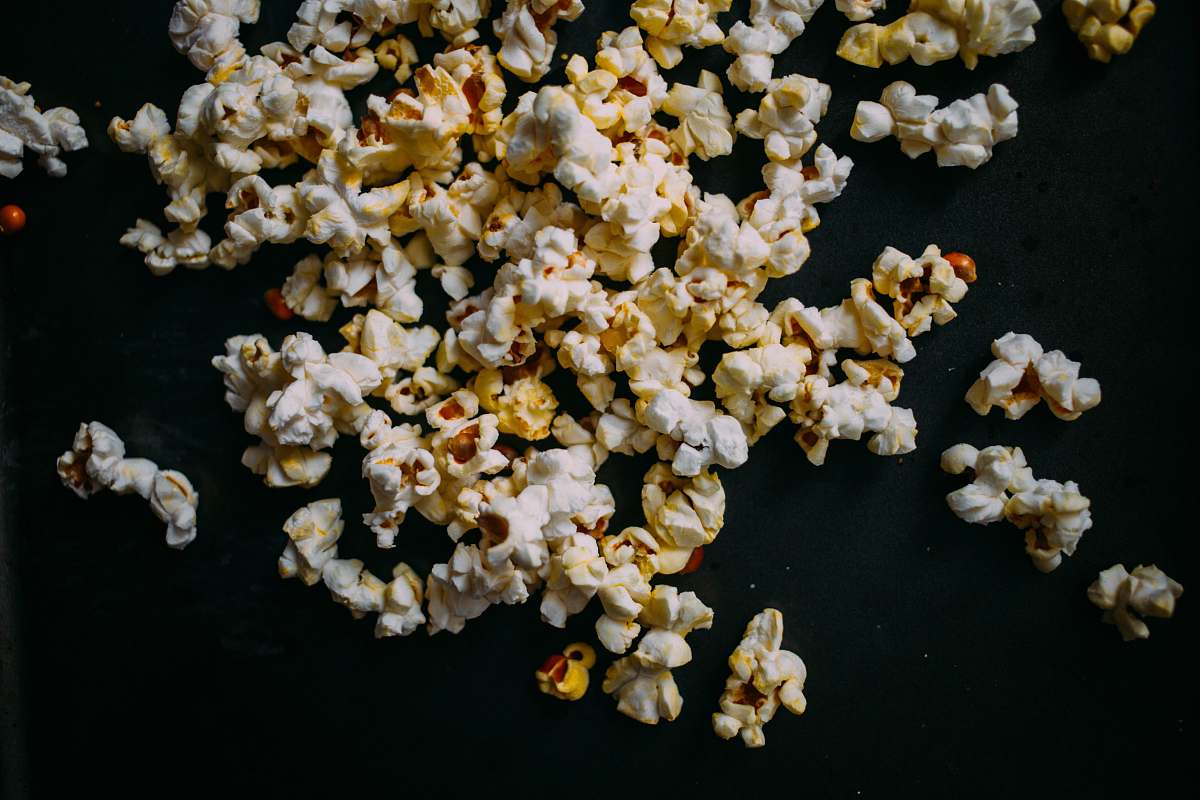 popcorn popcorn on black panel snack