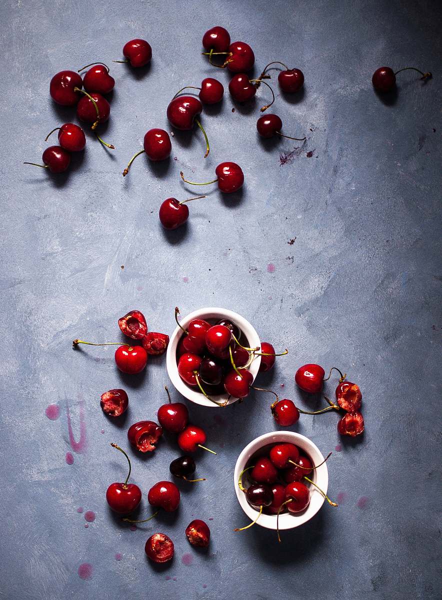 fruit red cherries inside white mug plant