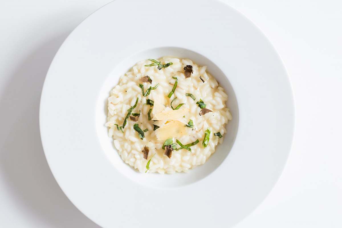 meal risotto on white ceramic plate white