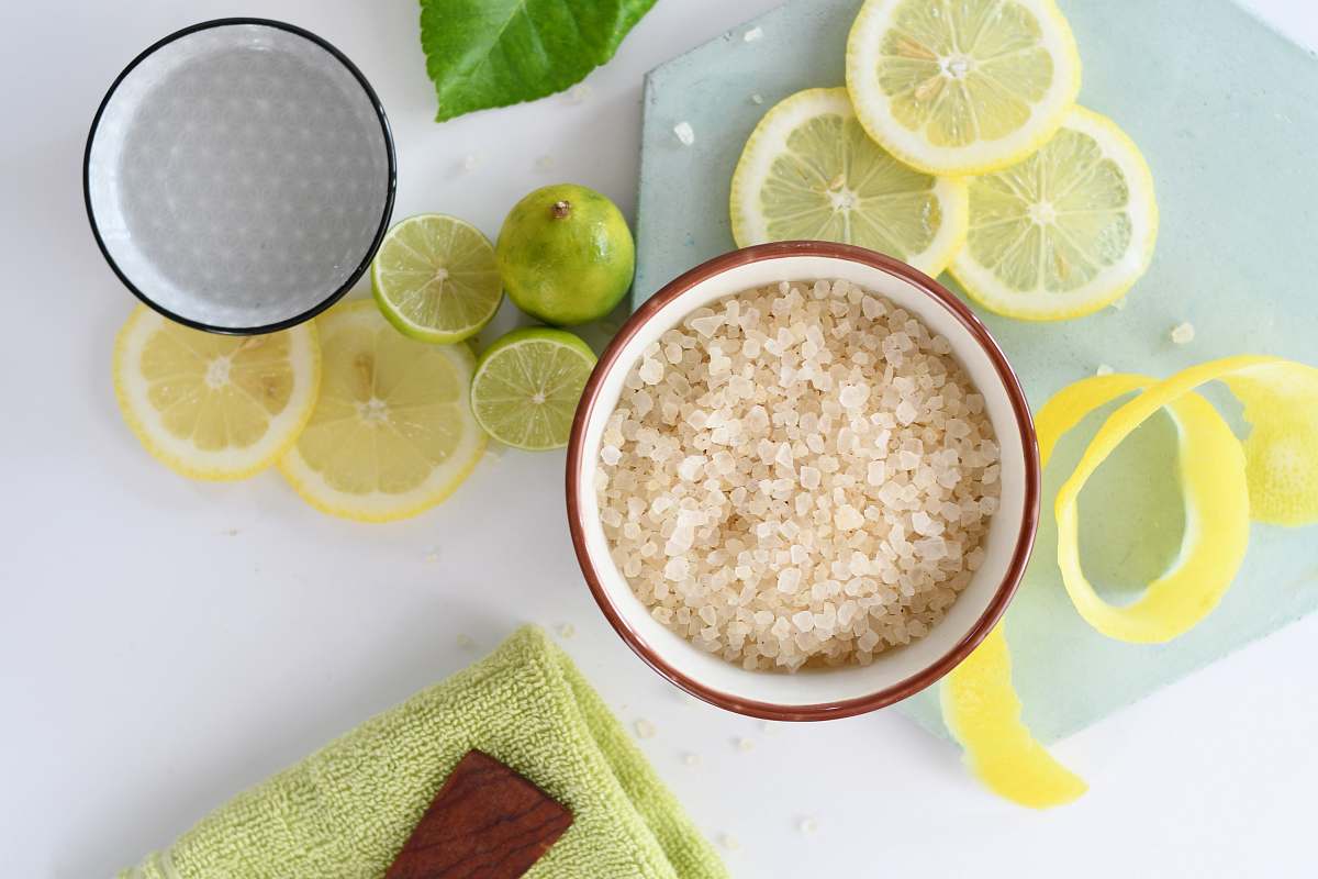 plant round white ceramic bowls beside sliced lemons fruit