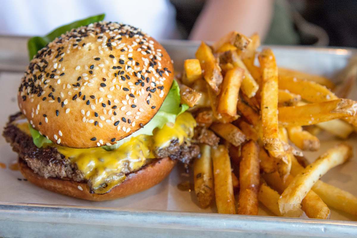 burger selective focus photo of burger and fries fries