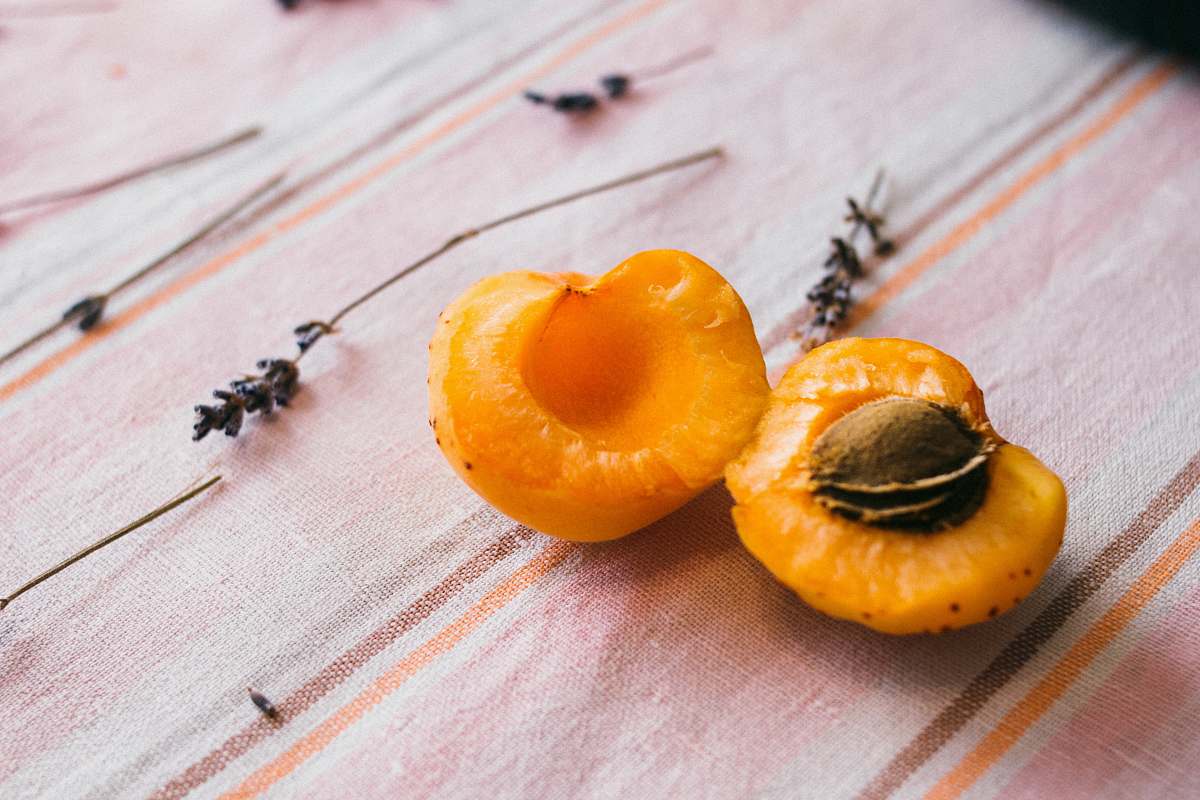 fruit selective focus photo of nuts orange