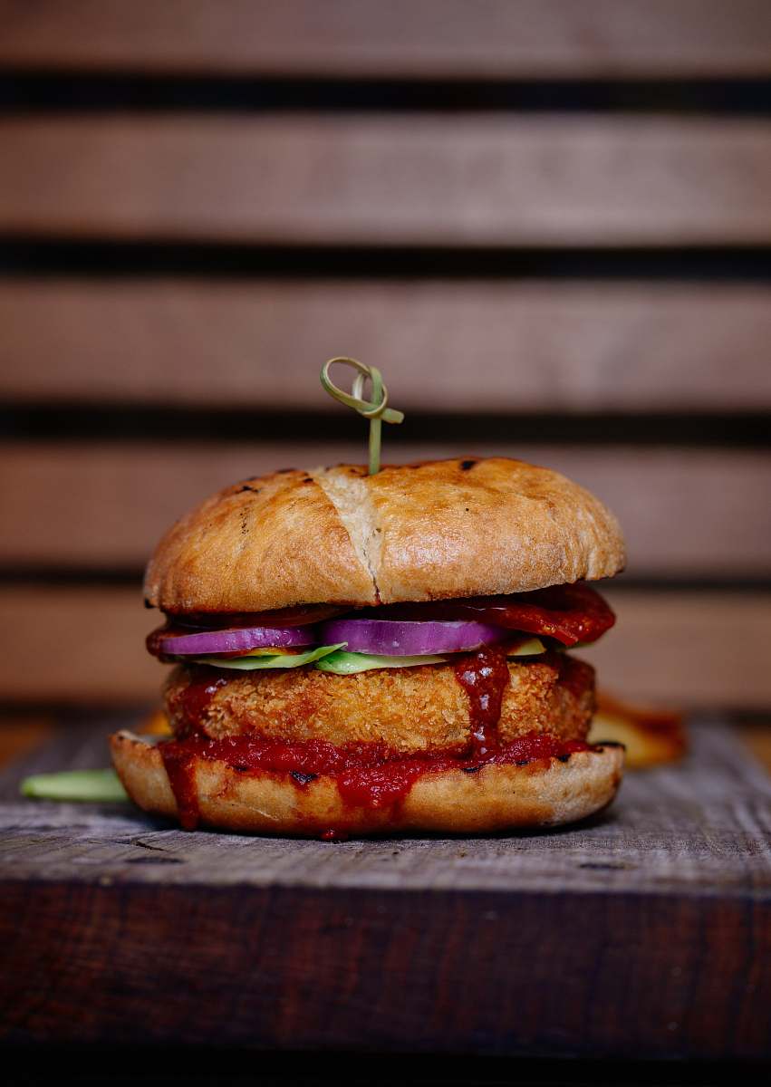 burger selective focus photography of burger on top of table meal