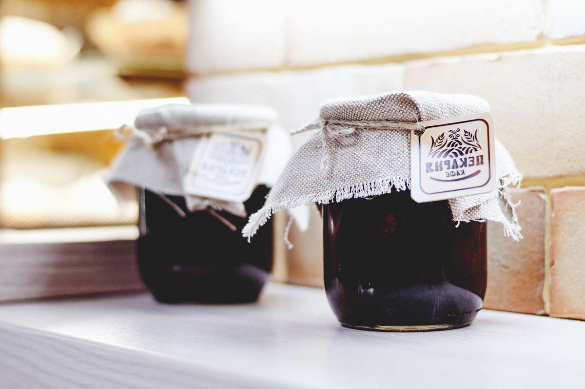 jam shallow focus photography of clear glass jar jar