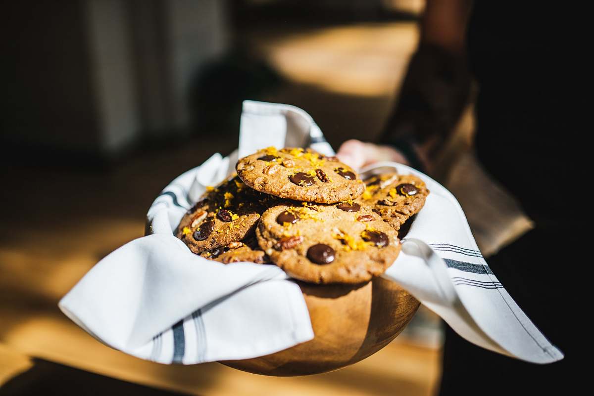 cookies shallow focus photography of cookies on bowl with towel cookie